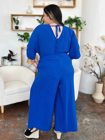 Double Take Full Size Surplice Wide Leg Jumpsuit with Pockets - Purcell's Clothing Company