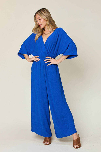 Double Take Full Size Surplice Wide Leg Jumpsuit with Pockets - Purcell's Clothing Company