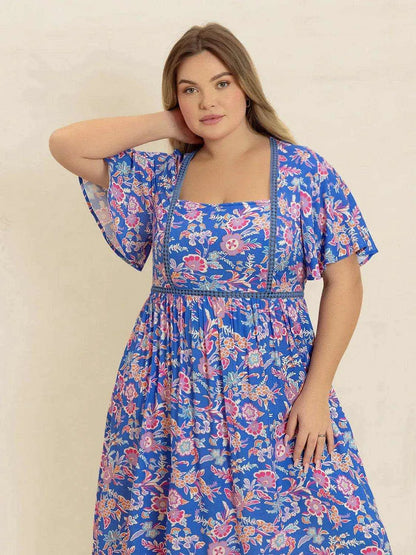 Plus Size Ruched Printed Short Sleeve Dress - Purcell's Clothing Company