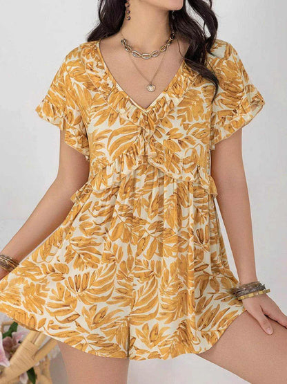 Printed V-neck short sleeve romper with ruffled details and buttoned front in yellow leaf print