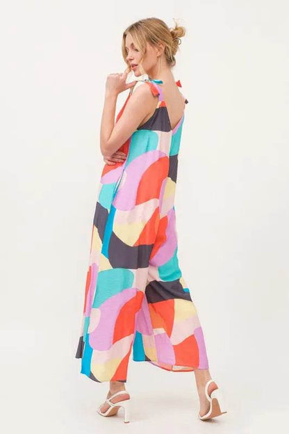 And The Why Tied Shoulder Straps Wide-Leg Geo Print Jumpsuit - Purcell's Clothing Company