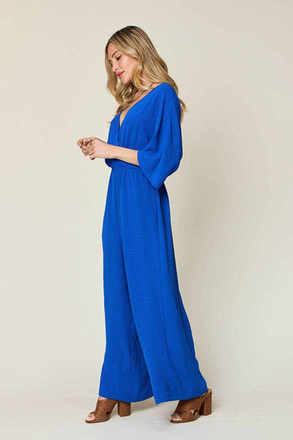 Double Take Full Size Surplice Wide Leg Jumpsuit with Pockets - Purcell's Clothing Company