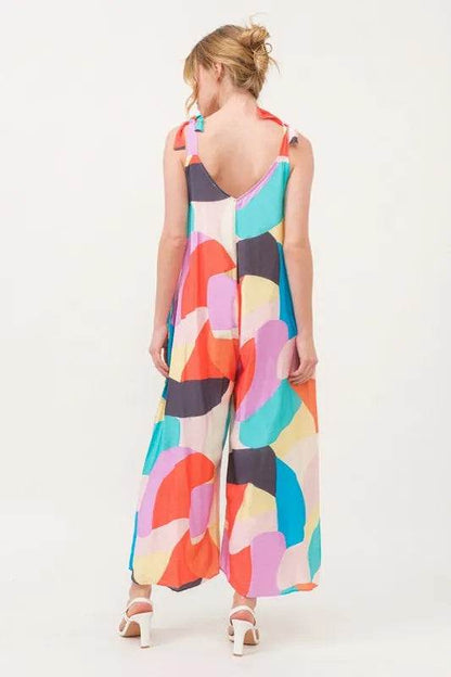 And The Why Tied Shoulder Straps Wide-Leg Geo Print Jumpsuit - Purcell's Clothing Company