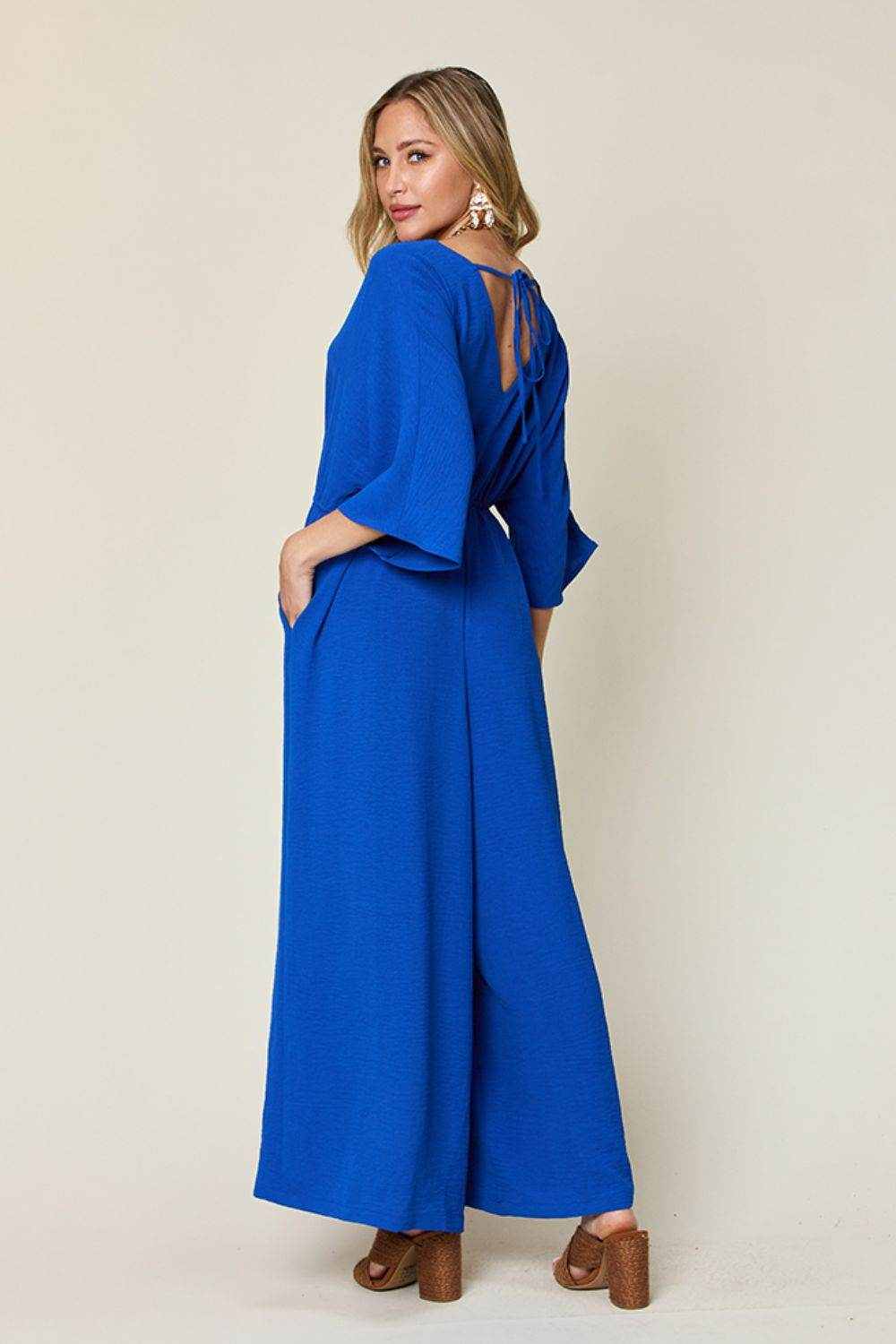 Double Take Full Size Surplice Wide Leg Jumpsuit with Pockets - Purcell's Clothing Company