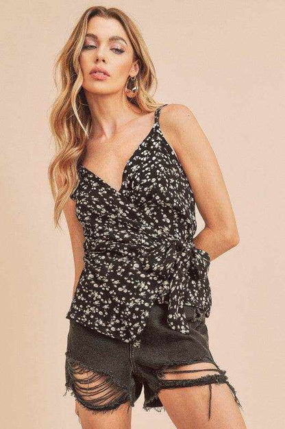 Aemi + Co Ditsy Floral Surplice adjustable straps cami top with black and white floral print and side tie detail