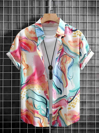 Colorful men's printed button up short sleeve shirt with abstract patterns on a hanger