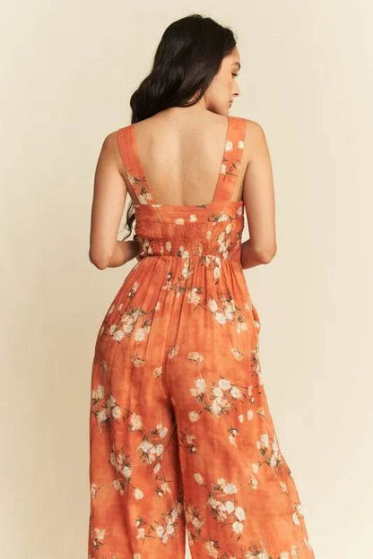 Davi & Dani Floral Ruffle Square Neck Smocking Bodice Jumpsuit - Purcell's Clothing Company